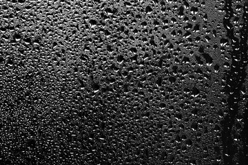 texture of a drop of rain on a glass wet transparent background