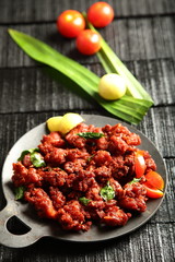 Traditional Indian food- spicy fried meat .