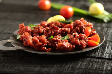 Delicious Indian chicken fried with spices and herbs,