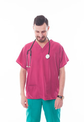 Friendly male doctor on white background. Young assistant in red shirt