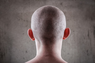Young man with a shaved head