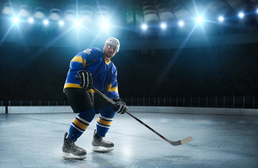 Fototapeta premium Ice hockey players on the grand ice arena