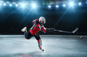 Fototapeta na wymiar Ice hockey players on the grand ice arena