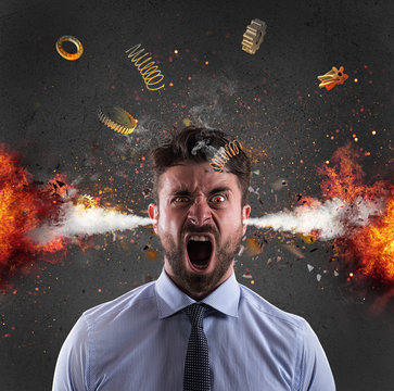 Head explosion of a businessman. concept of stress due to overwork