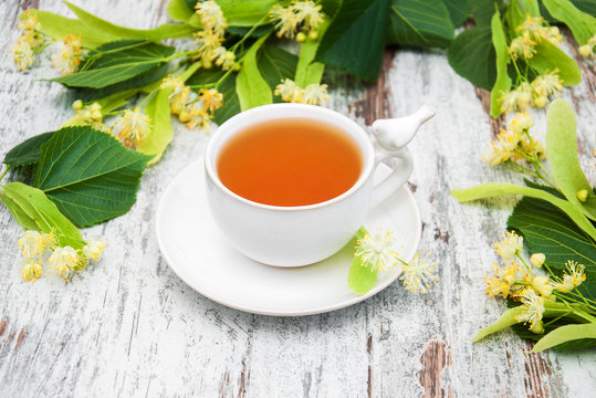 cup of herbal tea with linden flowers