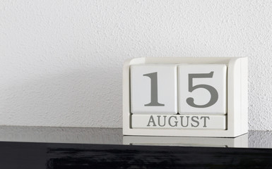 White block calendar present date 15 and month August