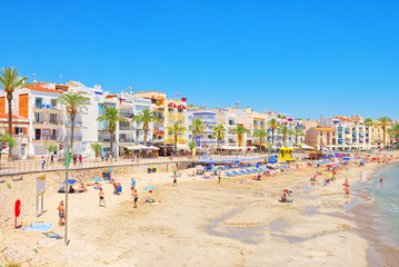 View of the beach and the sea shore of a small resort town Sitge