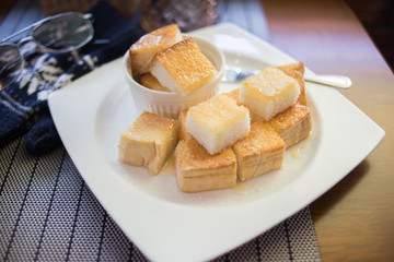 toast bread bake with honey on the plate
