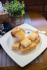 toast bread bake with honey on the plate