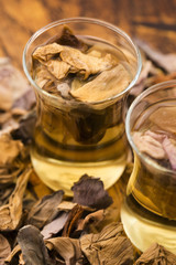 Lotus petals tea on wooden background