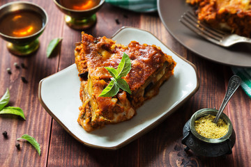Egg-plant lasagna with cheese and tomato sauce