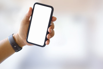 Man using smartphone, Mobile phone showing blank screen for graphic display montage.