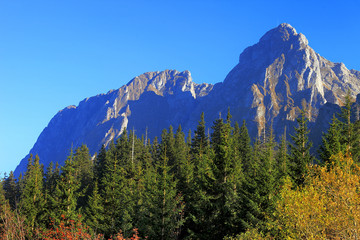Poland, Tatra Mountains, Zakopane - Giewont, Szczerba and Long Giewont peaks seen from the Grzybowiecka Valley