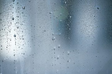 texture of a drop of rain on a glass wet transparent background
