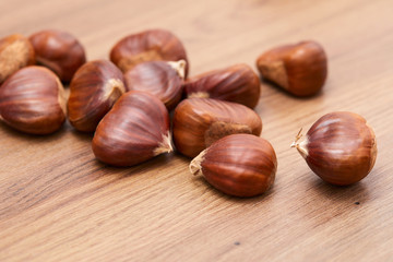 Obraz na płótnie Canvas edible chestnut on the table