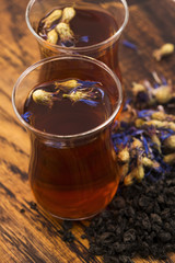Glass cup with a cornflower tea