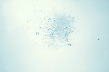 Fototapeta na wymiar underwater air bubbles texture light blue background