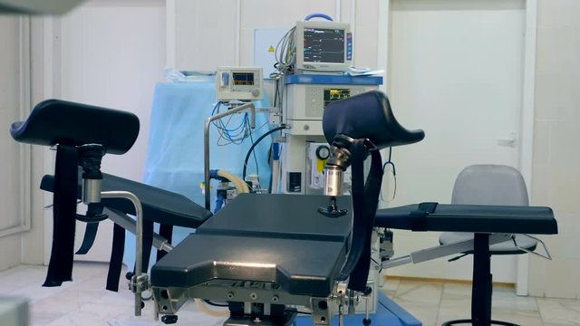 Close up of a gynecological examination chair in a medical room