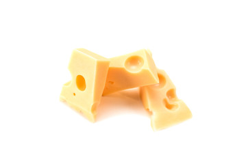 Three slices of Swiss cheese on a white background