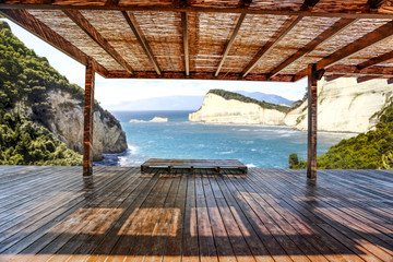 Fototapeta na wymiar wooden brown terrace and landscape of sea 