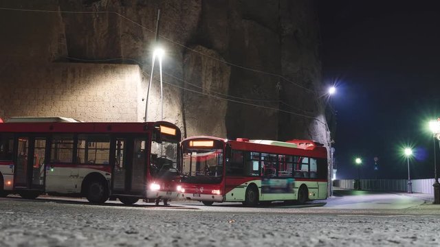 Busy bus stop at night timelapse, Sorrento, Meta, Italy, traffic, transpotation concept