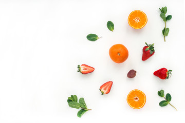 Healthy breakfast with yogurt, muesli, fruits, orange, berry, strawberry, blueberries on white background, flat lay, top view