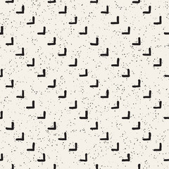 Hand drawn style ethnic seamless pattern. Abstract grungy geometric background in black and white.