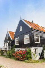 Old wooden house in historic fishing village Marken
