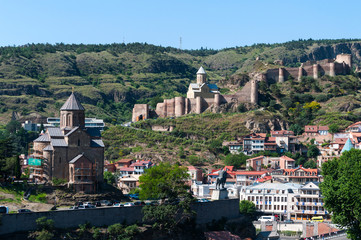 Fototapeta na wymiar Panoramic view of Narikala Fortress in Old Tbillisi and Metekhi Church, Tbilisi, Georgia