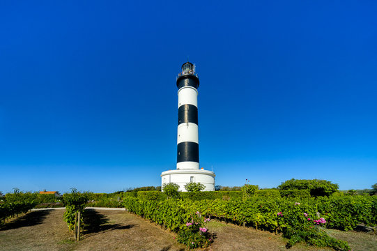 Phare de Chassiron. Island D'Oleron in the French Charente with striped lighthouse. France.
