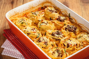 Casserole, stuffing pasta nests.