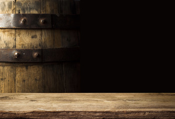 background of barrel and worn old table of wood