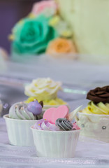 Sweet wedding cupcakes./ Sweet beauty flower and topping pastel color on wedding cake decoration.