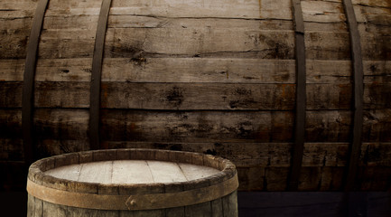 Fototapeta premium background of barrel and worn old table of wood