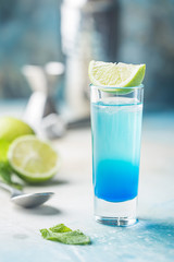 A blue layer alcoholic cocktail