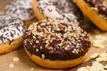 Several donuts with almond flakes