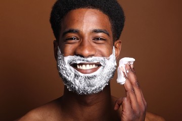 Beautiful man shaving