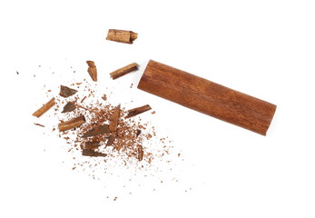 Cinnamon sticks with shavings isolated on white background, top view