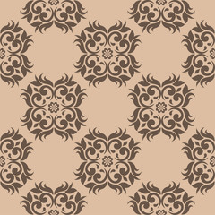 Brown floral ornament on beige background. Seamless pattern