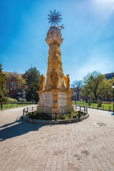 Fototapeta premium Monument of the Holy Trinity in Subotica, Serbia. Monument who donated Matej Vojnic symbolizes harmony, unity of the people of Subotica, at a time when the population of the joint efforts drained the 