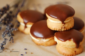 Fresh pastries cakes Boucher and lavender on the table 