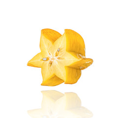 Fototapeta premium Carambola, star fruit isolated on white background with drop shadow.