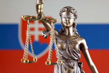 Symbol of law and justice with Slovakia Flag. Close up.