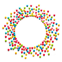 Frame of multicolored sweet candy dragees