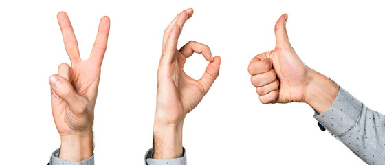 Hand of man making OK sign and victory sign