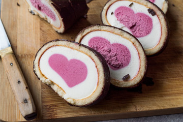 Heart Shaped Ice Cream Roll Cake with Vanilla and Chocolate.