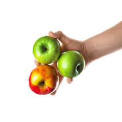 Man holding bunch of red and green apples in his hand. Isolated on white background. 