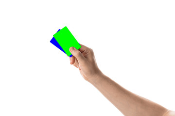Male hand holds a credit card or business card. Isolated with chroma key and all isolated on white background.
