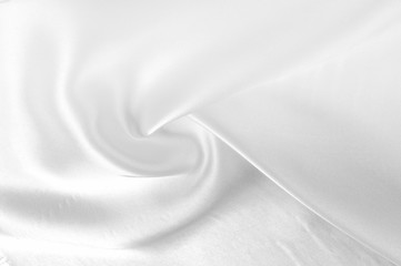 White silk fabric with a luxurious texture Glows like freshly fallen snow. Made from a silk and...
