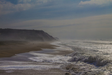hazy weather and a stormy ocean